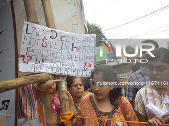 Citizens attend the Junior Doctors hunger strike to protest the rape and murder case of a medic in a government-run hospital in Kolkata, Ind...