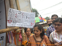 Citizens attend the Junior Doctors hunger strike to protest the rape and murder case of a medic in a government-run hospital in Kolkata, Ind...