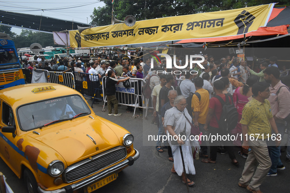 Citizens attend the Junior Doctors hunger strike to protest the rape and murder case of a medic in a government-run hospital in Kolkata, Ind...