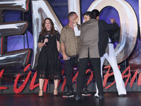 Tom Hardy, Kelly Marcel, and Cristo Fernandez attend the black carpet fan event for Venom: The Last Dance at Toreo Parque Central in Mexico...