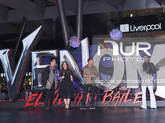 Tom Hardy, Kelly Marcel, and Cristo Fernandez attend the black carpet fan event for Venom: The Last Dance at Toreo Parque Central in Mexico...