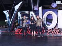 Tom Hardy, Kelly Marcel, and Cristo Fernandez attend the black carpet fan event for Venom: The Last Dance at Toreo Parque Central in Mexico...