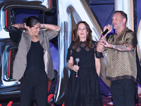 Tom Hardy, Kelly Marcel, and Cristo Fernandez attend the black carpet fan event for Venom: The Last Dance at Toreo Parque Central in Mexico...