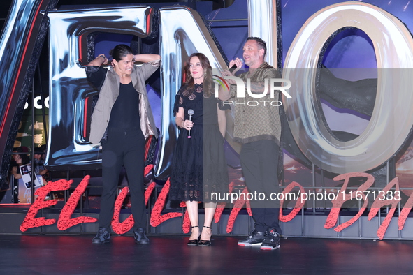 Tom Hardy, Kelly Marcel, and Cristo Fernandez attend the black carpet fan event for Venom: The Last Dance at Toreo Parque Central in Mexico...