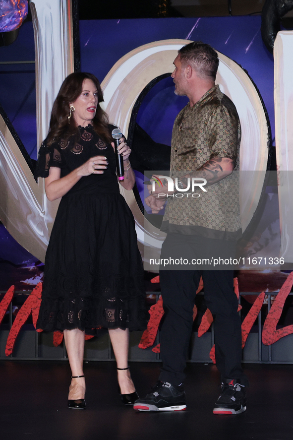 Tom Hardy and Kelly Marcel attend the black carpet fan event for Venom: The Last Dance at Toreo Parque Central in Mexico City, Mexico, on Oc...