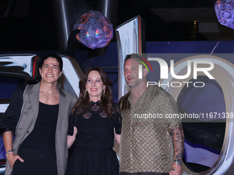 Tom Hardy, Kelly Marcel, and Cristo Fernandez attend the black carpet fan event for Venom: The Last Dance at Toreo Parque Central in Mexico...