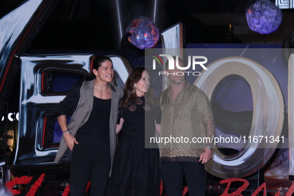 Tom Hardy, Kelly Marcel, and Cristo Fernandez attend the black carpet fan event for Venom: The Last Dance at Toreo Parque Central in Mexico...