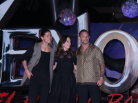 Tom Hardy, Kelly Marcel, and Cristo Fernandez attend the black carpet fan event for Venom: The Last Dance at Toreo Parque Central in Mexico...