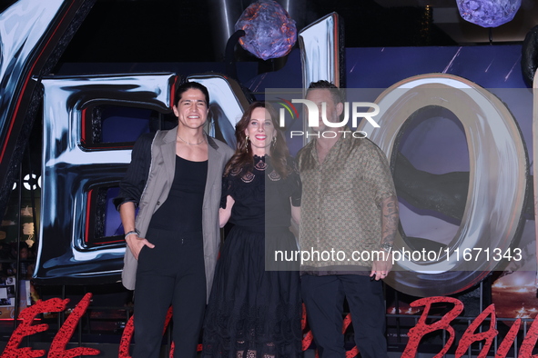 Tom Hardy, Kelly Marcel, and Cristo Fernandez attend the black carpet fan event for Venom: The Last Dance at Toreo Parque Central in Mexico...