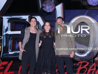 Tom Hardy, Kelly Marcel, and Cristo Fernandez attend the black carpet fan event for Venom: The Last Dance at Toreo Parque Central in Mexico...