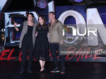 Tom Hardy, Kelly Marcel, and Cristo Fernandez attend the black carpet fan event for Venom: The Last Dance at Toreo Parque Central in Mexico...