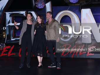 Tom Hardy, Kelly Marcel, and Cristo Fernandez attend the black carpet fan event for Venom: The Last Dance at Toreo Parque Central in Mexico...