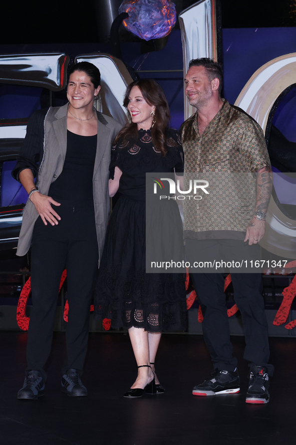 Tom Hardy, Kelly Marcel, and Cristo Fernandez attend the black carpet fan event for Venom: The Last Dance at Toreo Parque Central in Mexico...