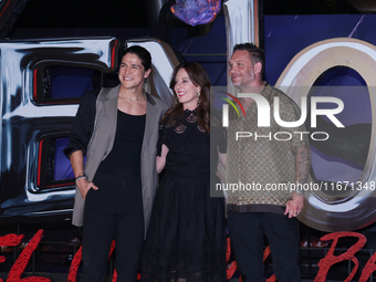 Tom Hardy, Kelly Marcel, and Cristo Fernandez attend the black carpet fan event for Venom: The Last Dance at Toreo Parque Central in Mexico...