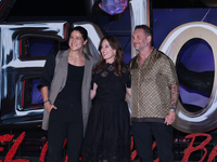 Tom Hardy, Kelly Marcel, and Cristo Fernandez attend the black carpet fan event for Venom: The Last Dance at Toreo Parque Central in Mexico...