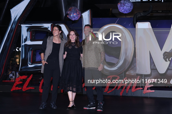 Tom Hardy, Kelly Marcel, and Cristo Fernandez attend the black carpet fan event for Venom: The Last Dance at Toreo Parque Central in Mexico...