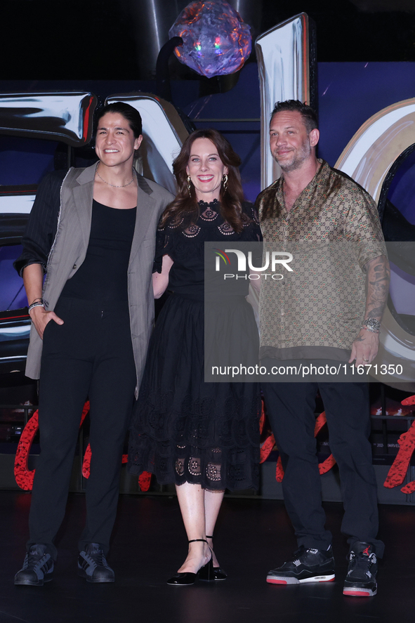 Tom Hardy, Kelly Marcel, and Cristo Fernandez attend the black carpet fan event for Venom: The Last Dance at Toreo Parque Central in Mexico...