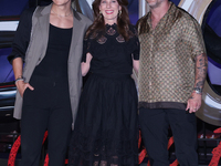 Tom Hardy, Kelly Marcel, and Cristo Fernandez attend the black carpet fan event for Venom: The Last Dance at Toreo Parque Central in Mexico...