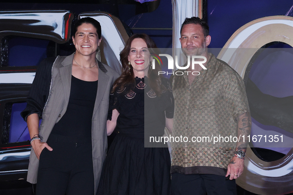 Tom Hardy, Kelly Marcel, and Cristo Fernandez attend the black carpet fan event for Venom: The Last Dance at Toreo Parque Central in Mexico...