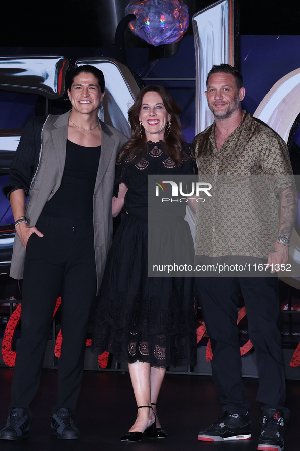 Tom Hardy, Kelly Marcel, and Cristo Fernandez attend the black carpet fan event for Venom: The Last Dance at Toreo Parque Central in Mexico...