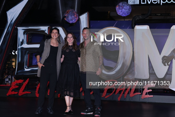 Tom Hardy, Kelly Marcel, and Cristo Fernandez attend the black carpet fan event for Venom: The Last Dance at Toreo Parque Central in Mexico...