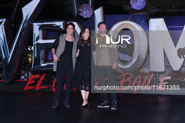 Tom Hardy, Kelly Marcel, and Cristo Fernandez attend the black carpet fan event for Venom: The Last Dance at Toreo Parque Central in Mexico...