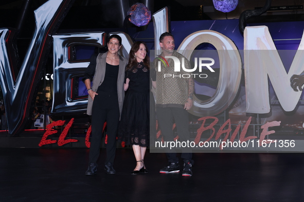 Tom Hardy, Kelly Marcel, and Cristo Fernandez attend the black carpet fan event for Venom: The Last Dance at Toreo Parque Central in Mexico...