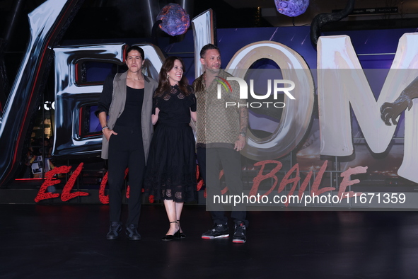 Tom Hardy, Kelly Marcel, and Cristo Fernandez attend the black carpet fan event for Venom: The Last Dance at Toreo Parque Central in Mexico...