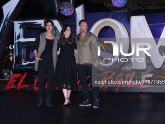 Tom Hardy, Kelly Marcel, and Cristo Fernandez attend the black carpet fan event for Venom: The Last Dance at Toreo Parque Central in Mexico...