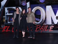 Tom Hardy, Kelly Marcel, and Cristo Fernandez attend the black carpet fan event for Venom: The Last Dance at Toreo Parque Central in Mexico...