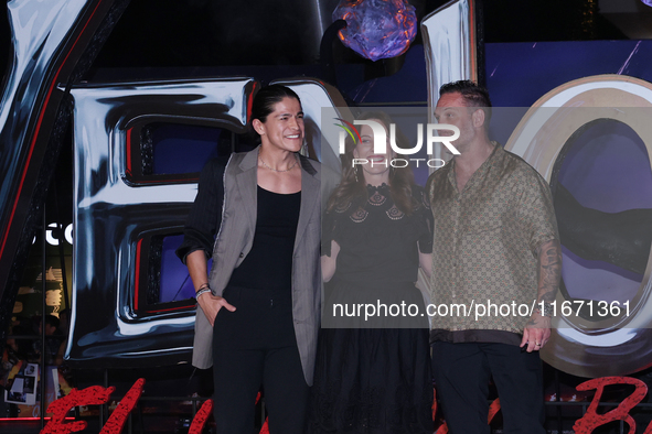 Tom Hardy, Kelly Marcel, and Cristo Fernandez attend the black carpet fan event for Venom: The Last Dance at Toreo Parque Central in Mexico...