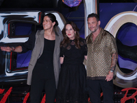 Tom Hardy, Kelly Marcel, and Cristo Fernandez attend the black carpet fan event for Venom: The Last Dance at Toreo Parque Central in Mexico...