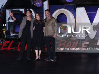 Tom Hardy, Kelly Marcel, and Cristo Fernandez attend the black carpet fan event for Venom: The Last Dance at Toreo Parque Central in Mexico...