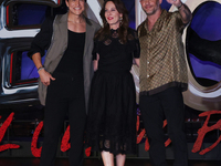 Tom Hardy, Kelly Marcel, and Cristo Fernandez attend the black carpet fan event for Venom: The Last Dance at Toreo Parque Central in Mexico...