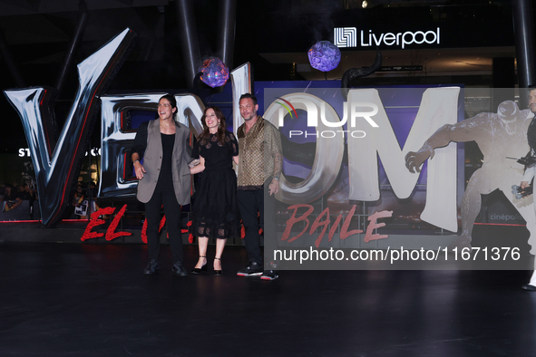 Tom Hardy, Kelly Marcel, and Cristo Fernandez attend the black carpet fan event for Venom: The Last Dance at Toreo Parque Central in Mexico...