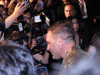 Tom Hardy attends the black carpet fan event for Venom: The Last Dance at Toreo Parque Central in Mexico City, Mexico, on October 15, 2024....