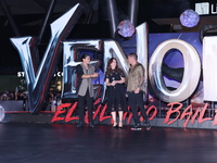 Tom Hardy, Kelly Marcel, and Cristo Fernandez attend the black carpet fan event for Venom: The Last Dance at Toreo Parque Central in Mexico...