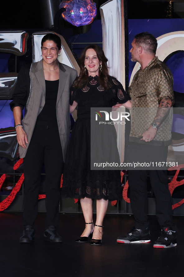 Tom Hardy, Kelly Marcel, and Cristo Fernandez attend the black carpet fan event for Venom: The Last Dance at Toreo Parque Central in Mexico...