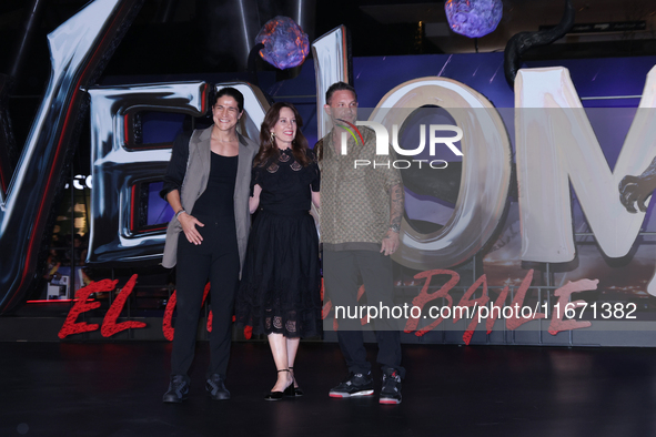 Tom Hardy, Kelly Marcel, and Cristo Fernandez attend the black carpet fan event for Venom: The Last Dance at Toreo Parque Central in Mexico...