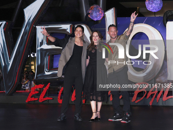 Tom Hardy, Kelly Marcel, and Cristo Fernandez attend the black carpet fan event for Venom: The Last Dance at Toreo Parque Central in Mexico...