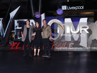 Tom Hardy, Kelly Marcel, and Cristo Fernandez attend the black carpet fan event for Venom: The Last Dance at Toreo Parque Central in Mexico...