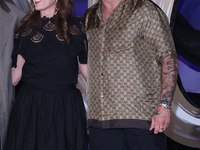 Tom Hardy and Kelly Marcel attend the black carpet fan event for Venom: The Last Dance at Toreo Parque Central in Mexico City, Mexico, on Oc...