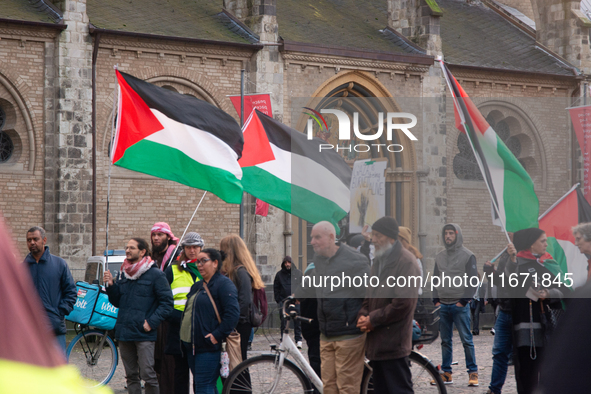 Dozens of pro-Palestinian activists gather at Muenster Square and protest against Israeli airstrike in Bonn, Germany, on October 16, 2024. 