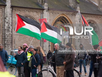 Dozens of pro-Palestinian activists gather at Muenster Square and protest against Israeli airstrike in Bonn, Germany, on October 16, 2024. (