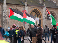 Dozens of pro-Palestinian activists gather at Muenster Square and protest against Israeli airstrike in Bonn, Germany, on October 16, 2024. (