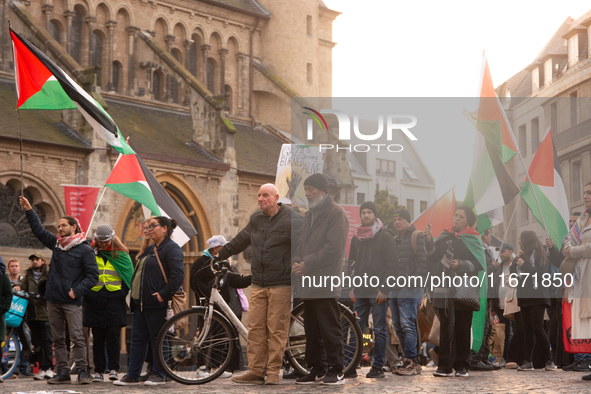 Dozens of pro-Palestinian activists gather at Muenster Square and protest against Israeli airstrike in Bonn, Germany, on October 16, 2024. 