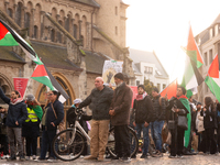 Dozens of pro-Palestinian activists gather at Muenster Square and protest against Israeli airstrike in Bonn, Germany, on October 16, 2024. (