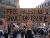 Dozens of pro-Palestinian activists gather at Muenster Square and protest against Israeli airstrike in Bonn, Germany, on October 16, 2024. (