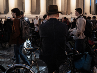 People gather to pay tribute to Paul, 27, a cyclist who is run over by a car in Paris following a dispute, at Place de la Madeleine with the...