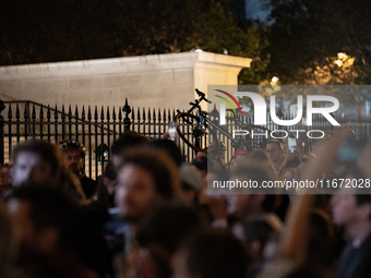 People gather to pay tribute to Paul, 27, a cyclist who was run over by a car following a dispute, in Paris, France, on October 16, 2024, at...